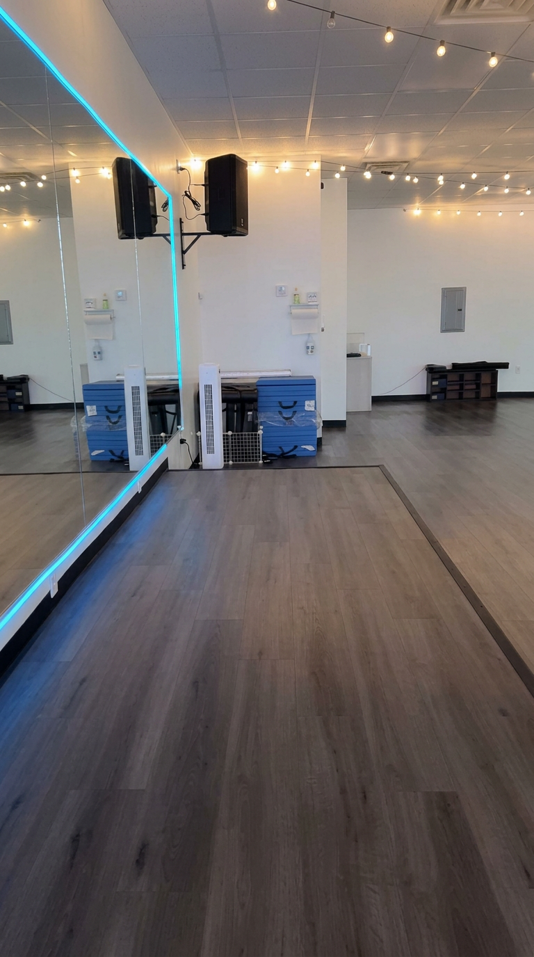 Mirrored wall, sound system and stacked step platforms at El Doco Loco